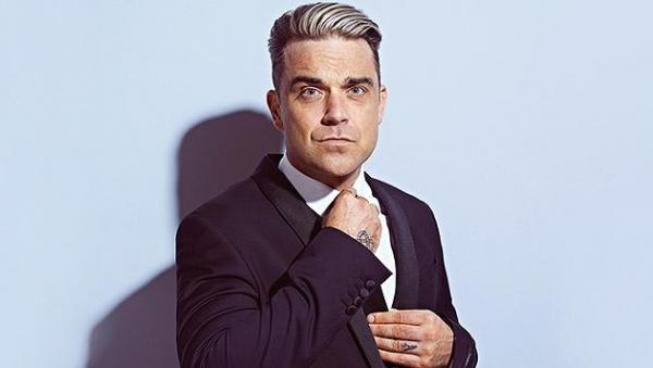 EXCLUSIV! Joi, 14 mai, PRIMUL INTERVIU acordat de Robbie Williams pentru o televiziune din România!