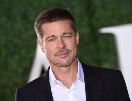 GALERIE FOTO: Brad Pitt, apariţie INCENDIARĂ pe covorul roşu alături de actriţa Marion Cotillard
