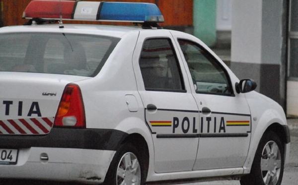 Poliţist EROU! Aflat în drum spre serviciu, a salvat un bărbat care şi-a dat foc într-o benzinărie din Capitală