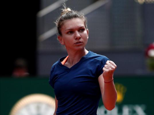 Simona Halep, plină de umor la conferinţa de după meciul de dublu, cu Irina Begu: "Am fost foarte motivată pentru că am fost lovită în cap la început"