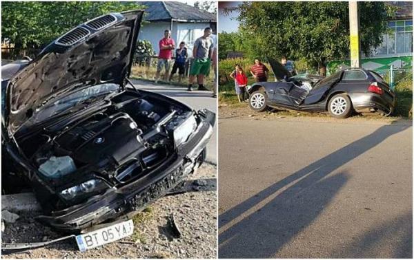 Şi-a făcut praf BMW-ul şi a băgat doi tineri în spital! Un şofer BĂUT s-a IZBIT VIOLENT cu maşina de un cap de pod, apoi a intrat într-un stâlp!