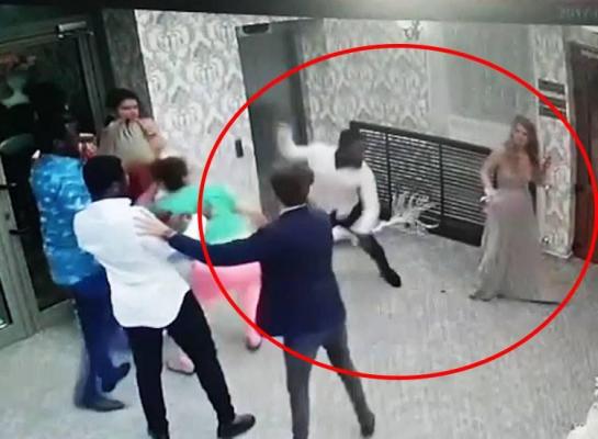 IMAGINI ŞOCANTE! O tânără a fost făcută KO cu un baston telescopic de un congolez la o nuntă din Capitală - VIDEO