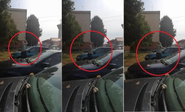 Înregistrare HALUCINANTĂ la Târgu Jiu. Înarmat cu un topor un bărbat face bucăţi o maşină lăsată pe locul lui de parcare (VIDEO)