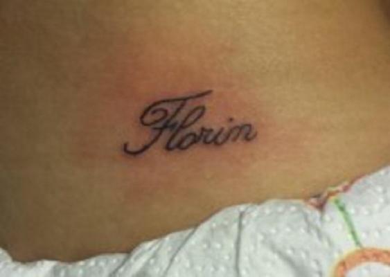 Român din Anglia reținut după ce și-a tatuat cu forța numele pe gâtul iubitei. Nemulțumit, Florin i-a distrus viața femeii