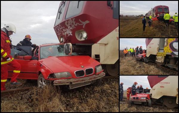 Un tânăr se zbate între viață și moarte, după ce mașina lui a fost lovită de tren, la Timișoara. BMW-ul a fost târât zeci de metri