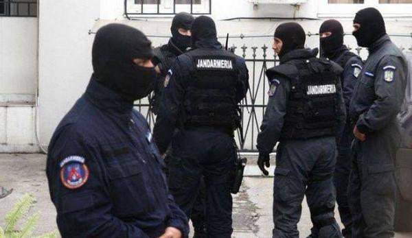 Percheziţii în Bucureşti şi în trei judeţe