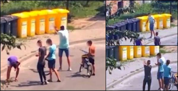 Tinerii isi exersau tinta cu arma în dreptul unui bloc de locuinţe