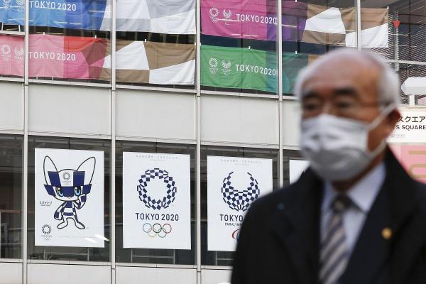 Jocurile Olimpice, bărbat cu mască de protecție