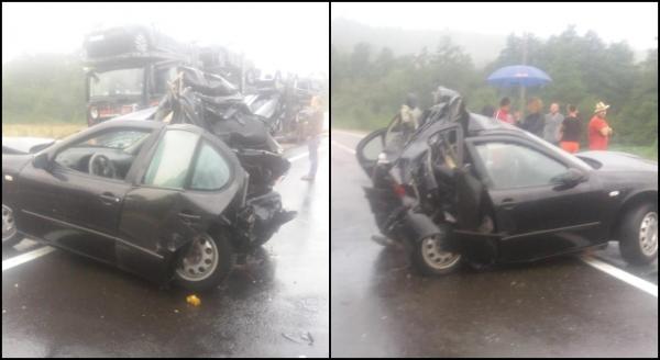 Doi morți într-o mașină strivită la impactul cu un camion, între Perșani și Codlea