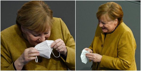 Cancelarul german izbucneşte în râs chiar înainte să îşi pună masca sanitară la loc