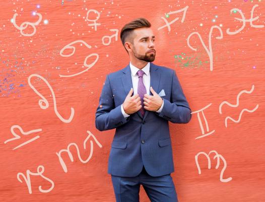 Semne zodiacale pe un fundal roșu și un om de afaceri