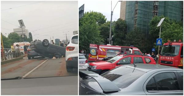 Accident grav în Capitală. O mașină s-a răsturnat pe plafon pe Şoseaua Mihai Bravu. Două persoane au fost rănite.