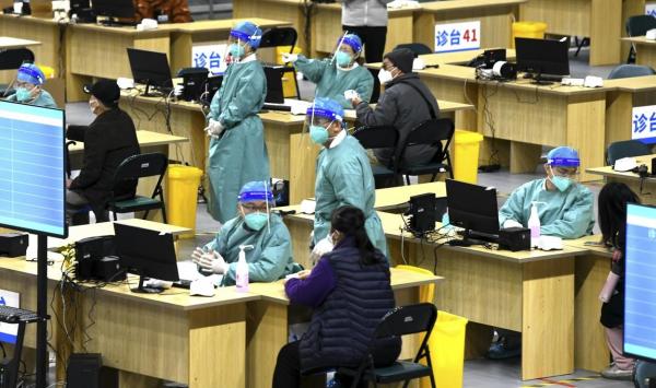 China se confruntă cu o creștere a numărului de cazuri Covid-19.