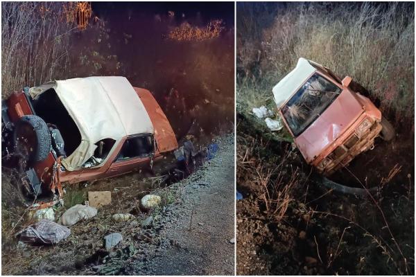 Un bărbat beat şi fără permis s-a răsturnat cu maşina într-un şant din Bistriţa, apoi a fugit. Şi-a abandonat pasagerul sub greutatea maşinii