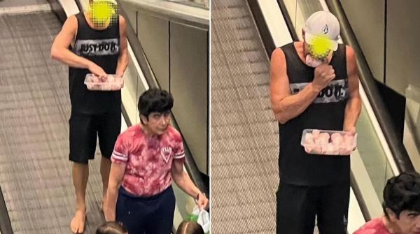 tânăr surprins în timp ce mănâncă carne crudă de găină, în Australia