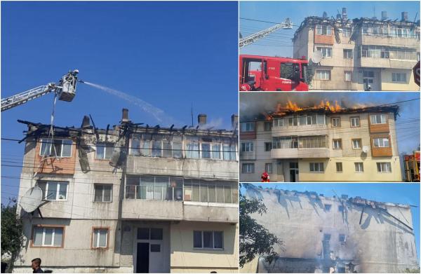 Acoperişul unui bloc din Focşani, făcut scrum după ce flăcările s-au extins de la o anexă. Doi locatari au avut nevoie de îngrijiri