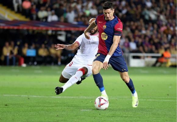 Robert Lewandowski a marcat două goluri pentru FC Barcelona în meciul cu FC Sevilla, din Primera Division