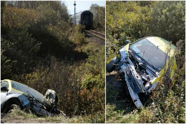Dacie spulberată cu putere de tren, pe un drum comunal din Sibiu. Şoferul de 67 de ani a fost rănit grav