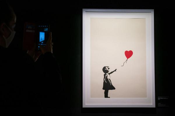 Tabloul "Girl With Balloon", semnat de Banksy