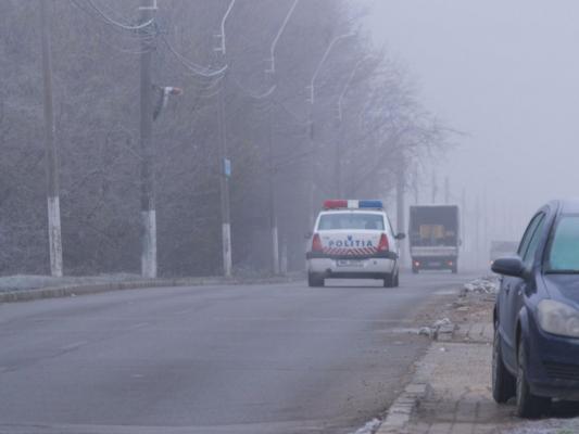 Masina de politie pe drum