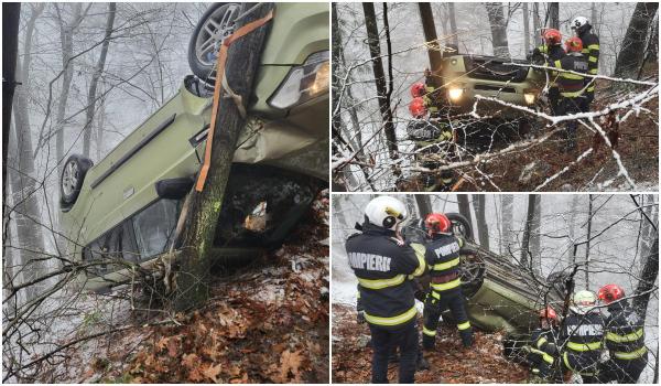 Maşină căzută în râpă în Maramureş. Un copac a salvat viaţa a trei pasageri, care riscau să cadă în Barajul Firiza
