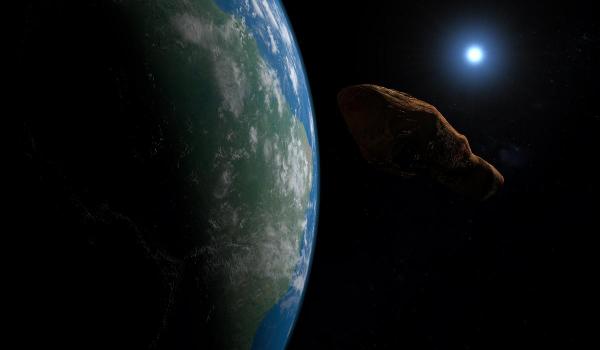 Un asteroid de dimensiunea a trei stadioane de fotbal a trecut astăzi pe lângă Pământ