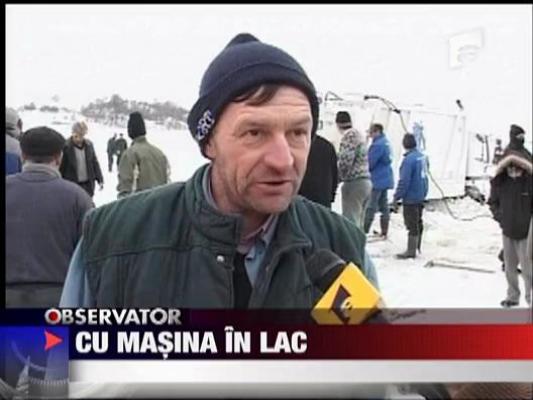 Cu masina in lac