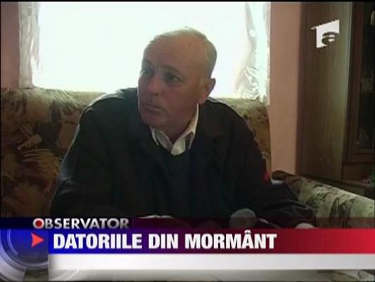 Datoriile din mormant!