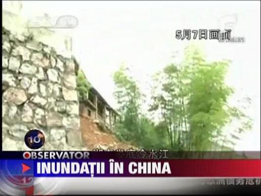 Inundatiile din China au facut deja 65 de morti