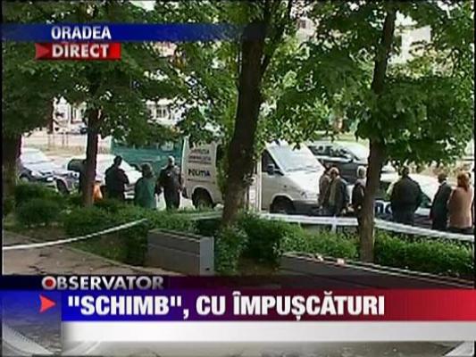 Patronul unei case de schimb si-a impuscat clientii