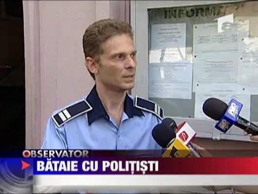 Bataie cu politisti