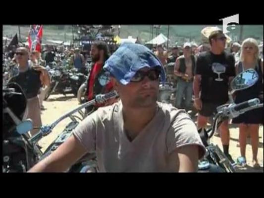 Vladimir Putin calare pe motor