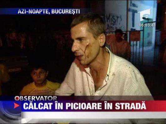 VIDEO SOCANT! Calcat in picioare in strada