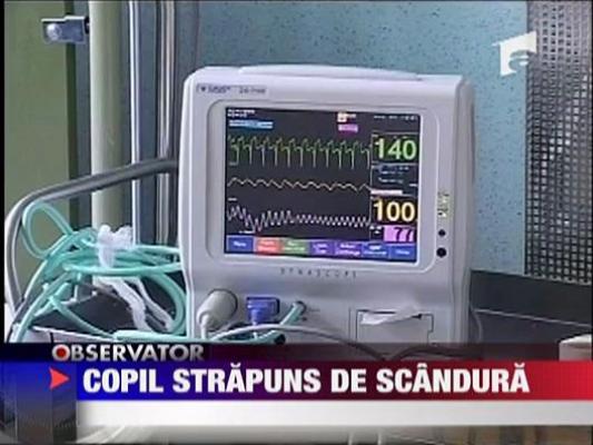 Copil strapuns de scandura