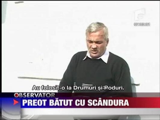 Preot batut cu scandura