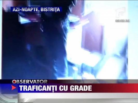 Traficanti cu grade