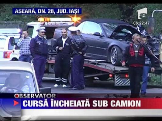 Cursa nebuna incheiata sub camion