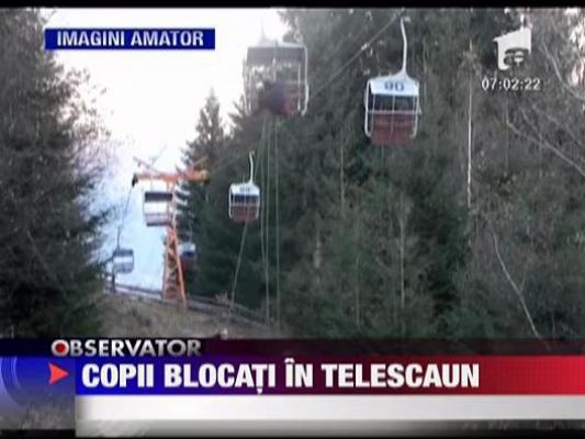 Copii blocati in telescaun