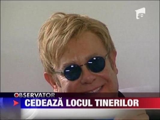 Elton John renunta la topuri
