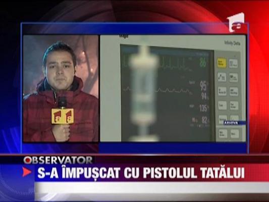 S-a impuscat in cap cu pistolul tatalui