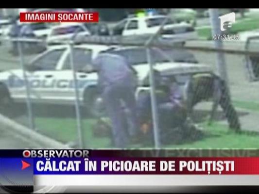 Imagini socante! Calcat in picioare de politisti
