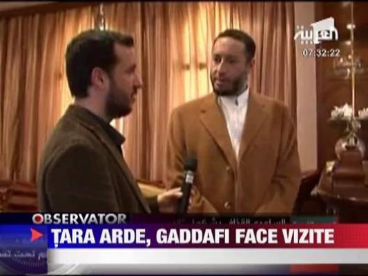 Gaddafi a acuzat presa ca exagereaza cu gravitatea situatiei din tara