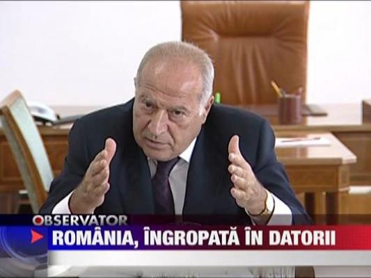 Romania, ingropata in datorii