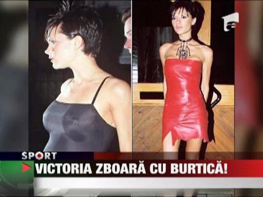 Victoria Beckham si-a etalat burtica