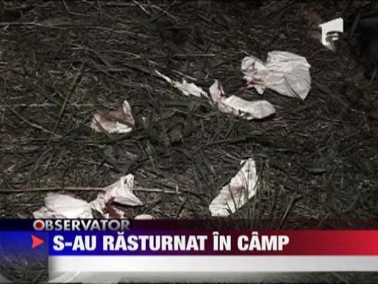 O familie intreaga s-a rasturnat cu masina pe un camp