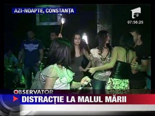 Distractie la malul marii