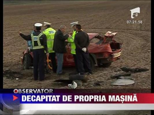 Decapitat in propria masina