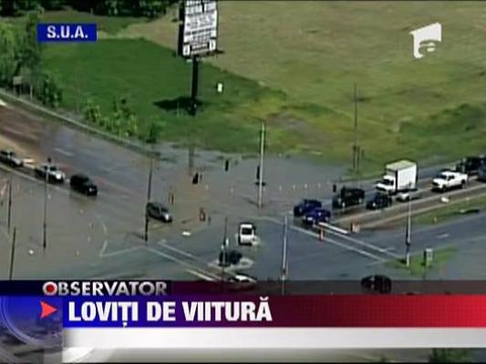 Americanii, loviti de viitura