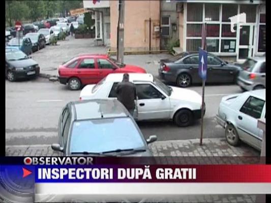 Inspectori dupa gratii