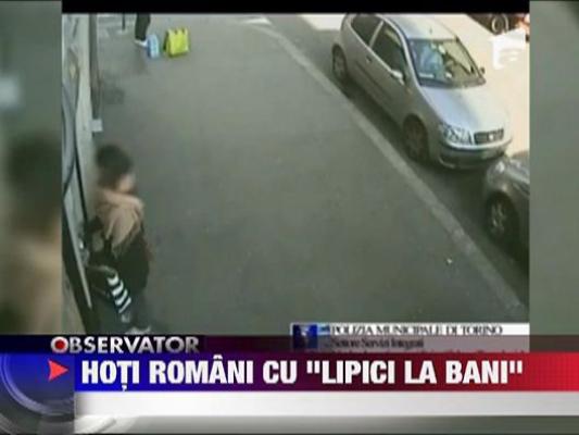 Hoti romani cu "lipici la bani"